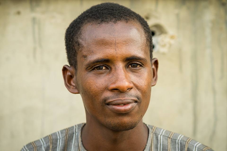 A Nigerian tradesman photographed at work